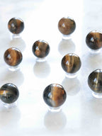 Mini sphères en Œil-de-Faucon - Pierre pour la projection & la concentration - SOLYA - Bijoux, Cristaux et mineraux en Belgique - Boutique de pierres naturelles et ethiques