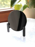 Miroir en obsidienne mexicaine sculptée, reflets profonds et sombres, gemme décorative naturelle
