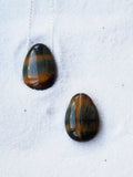 Oeil-de-Tigre perce | Pierre pour laisser briller sa lumiere | SOLYA | Pierres ethiques et naturelles en Belgique | Bijoux, cristaux et mineraux