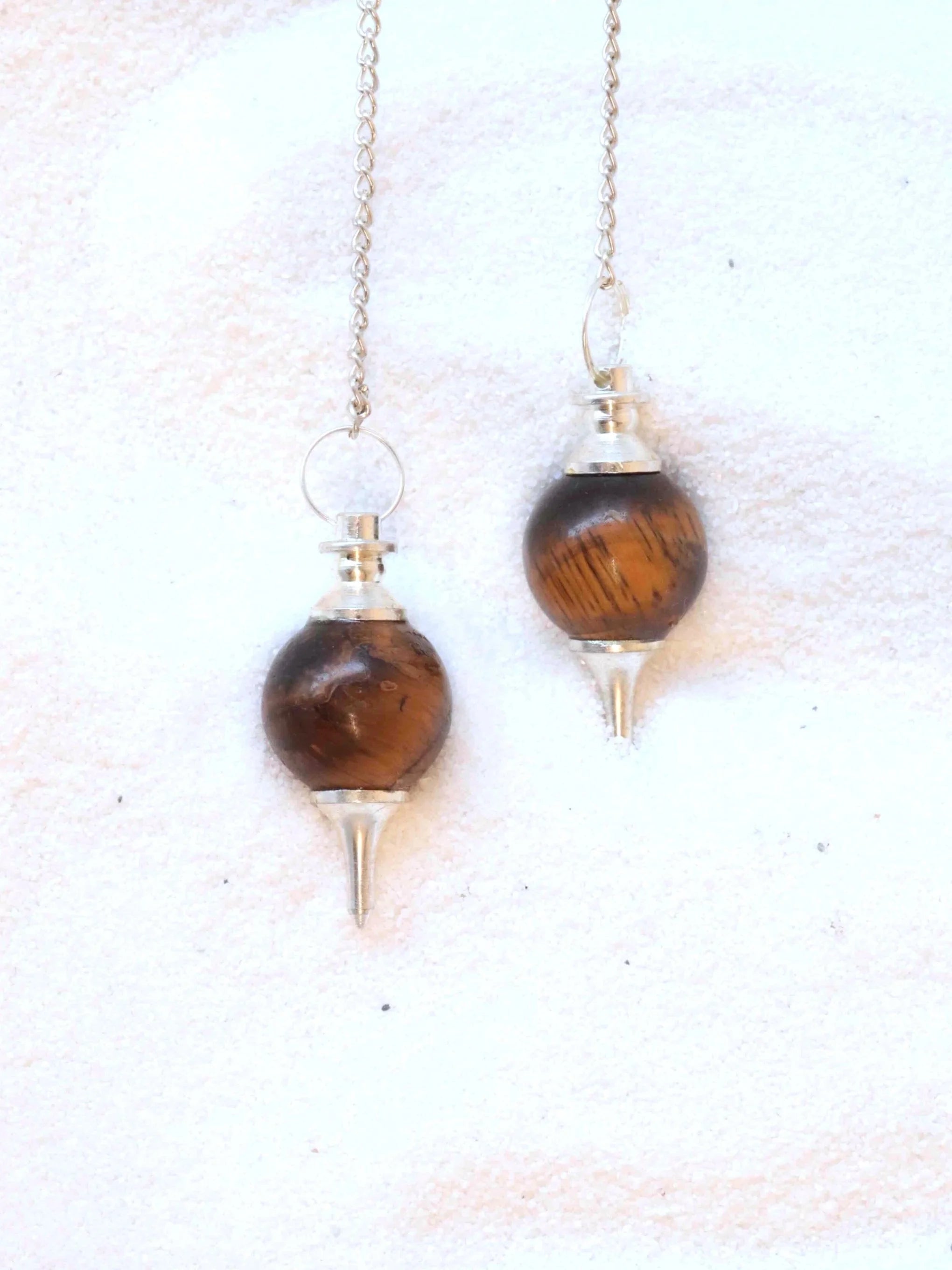 Pendule Oeil-de-Tigre | Pierre pour laisser briller sa lumiere | SOLYA | Pierres ethiques et naturelles en Belgique | Bijoux, cristaux et mineraux