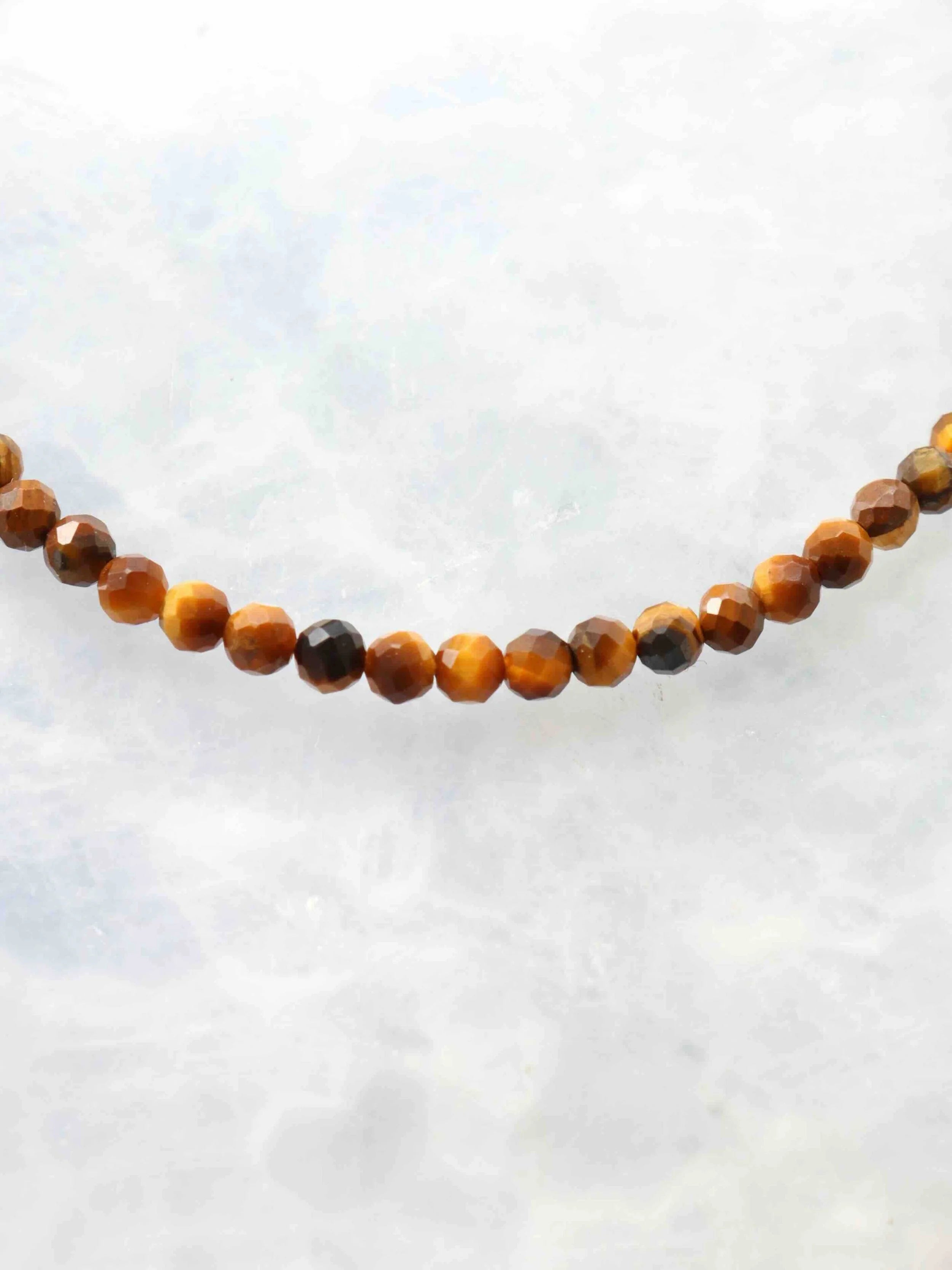 Perles Oeil-de-Tigre | Pierre pour laisser briller sa lumiere | SOLYA | Pierres ethiques et naturelles en Belgique | Bijoux, cristaux et mineraux